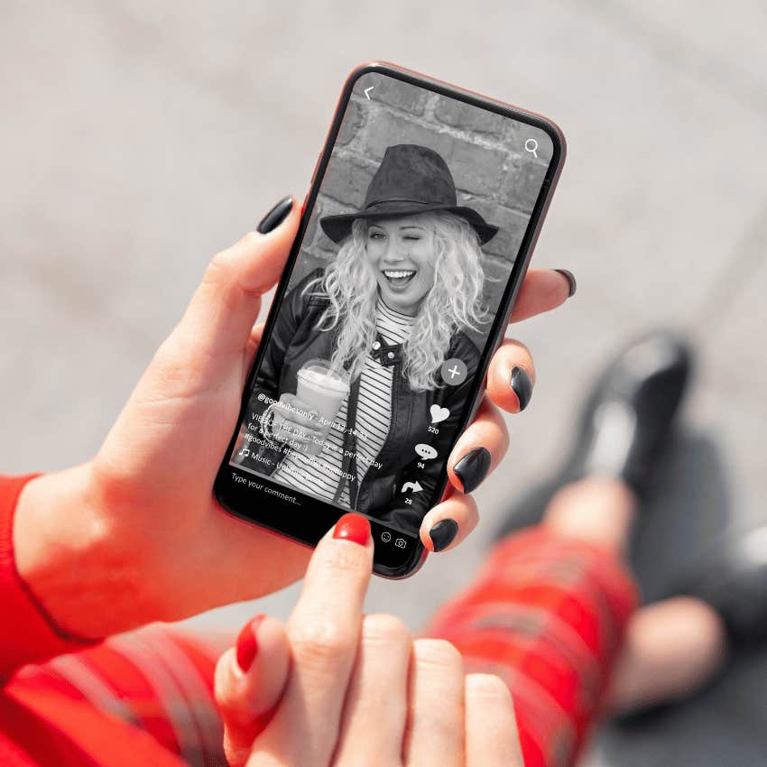person who rarely gets distracted using phone in grayscale