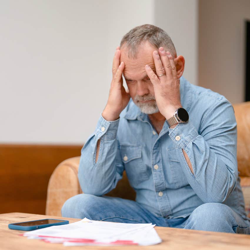 overwhelmed man with hands on hand who ignores calls and forgets to text back