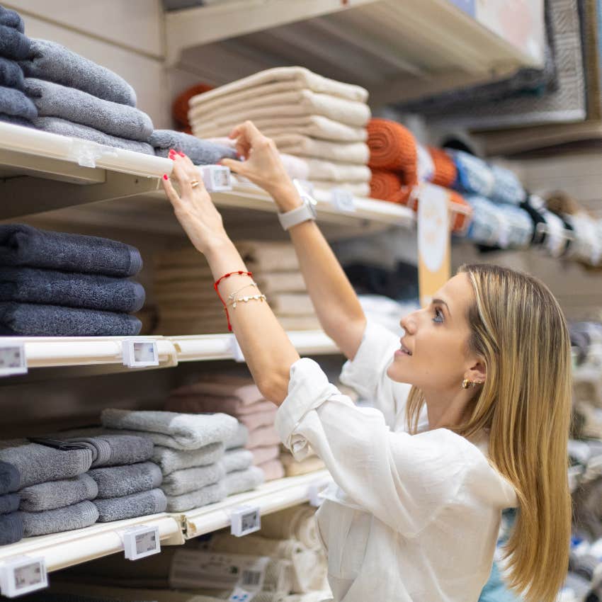 strategic woman shopping for towels at marshalls