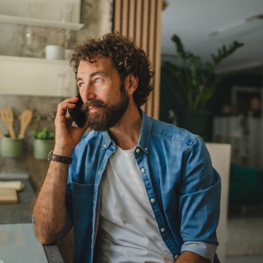 mentally and emotionally relaxed man talking on the phone asking for time to think about a problem