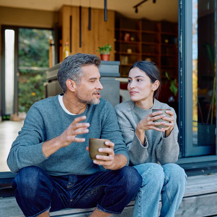 mentally and emotionally relaxed man telling girlfriend we'll figure it out over coffee