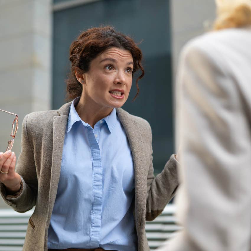 woman lacking emotional availability having an argument with a colleague