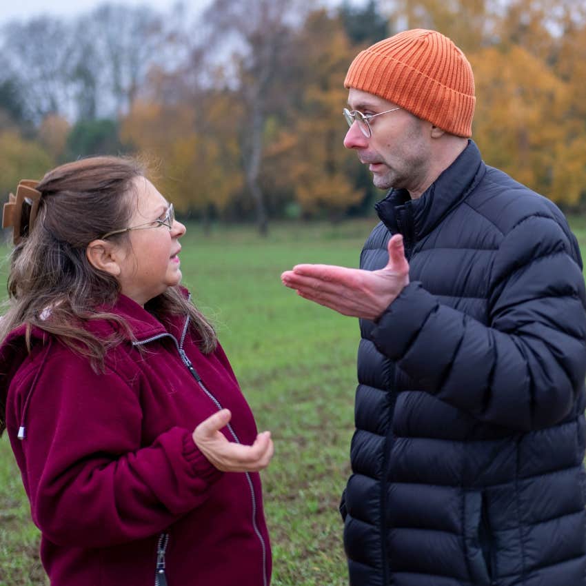 rude man telling his wife she's acting crazy