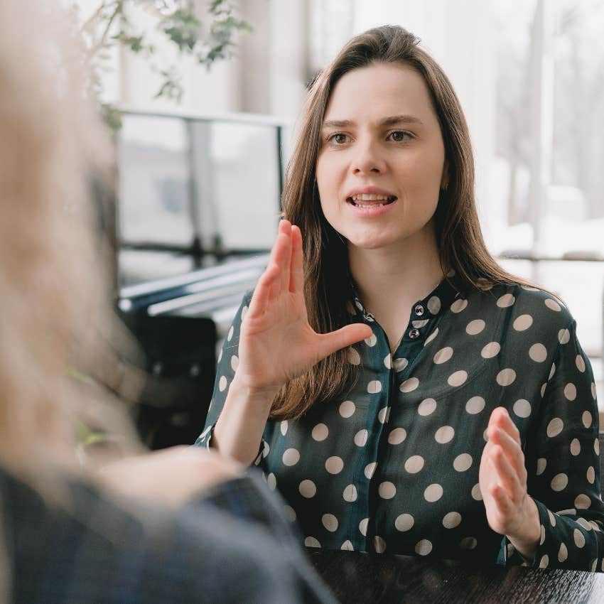 woman with an attitude problem asking friend why even try that