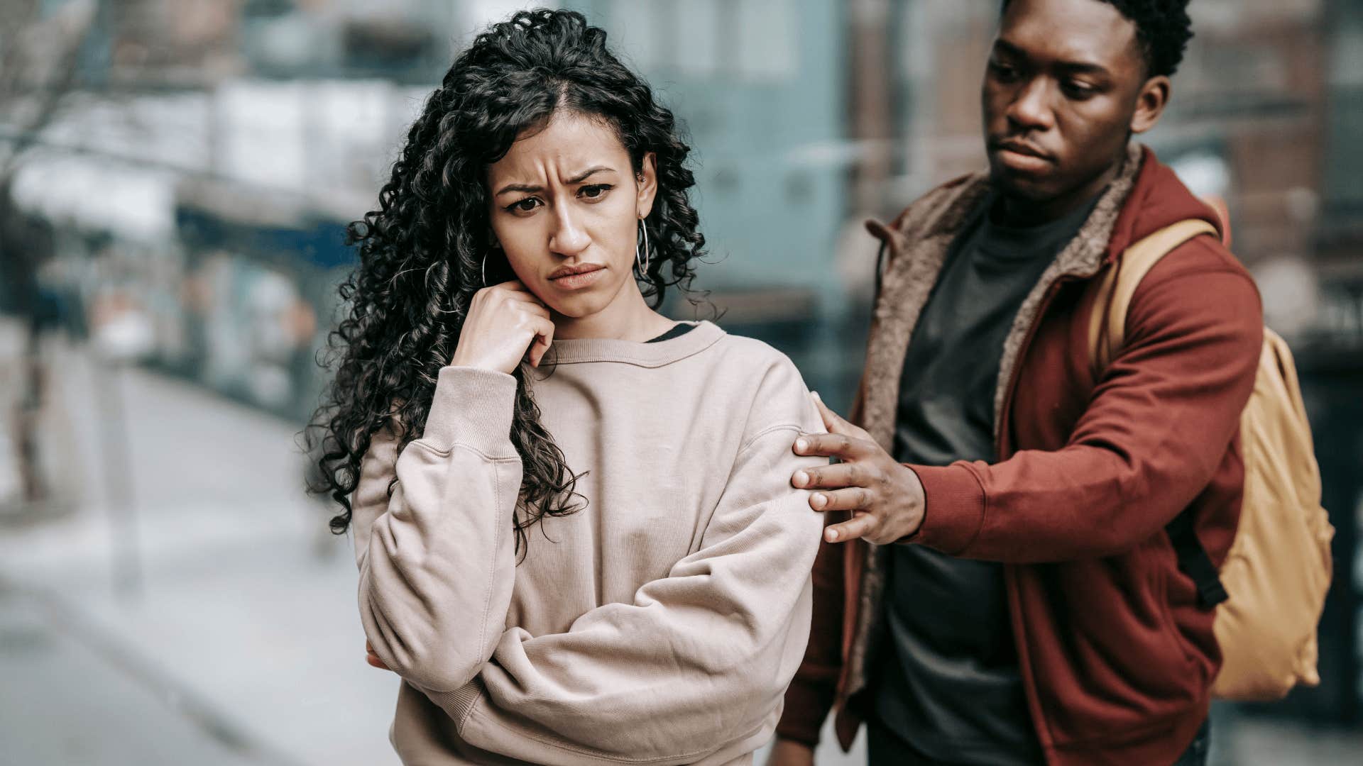 woman with weak resilience walking away from partner saying i can't do this