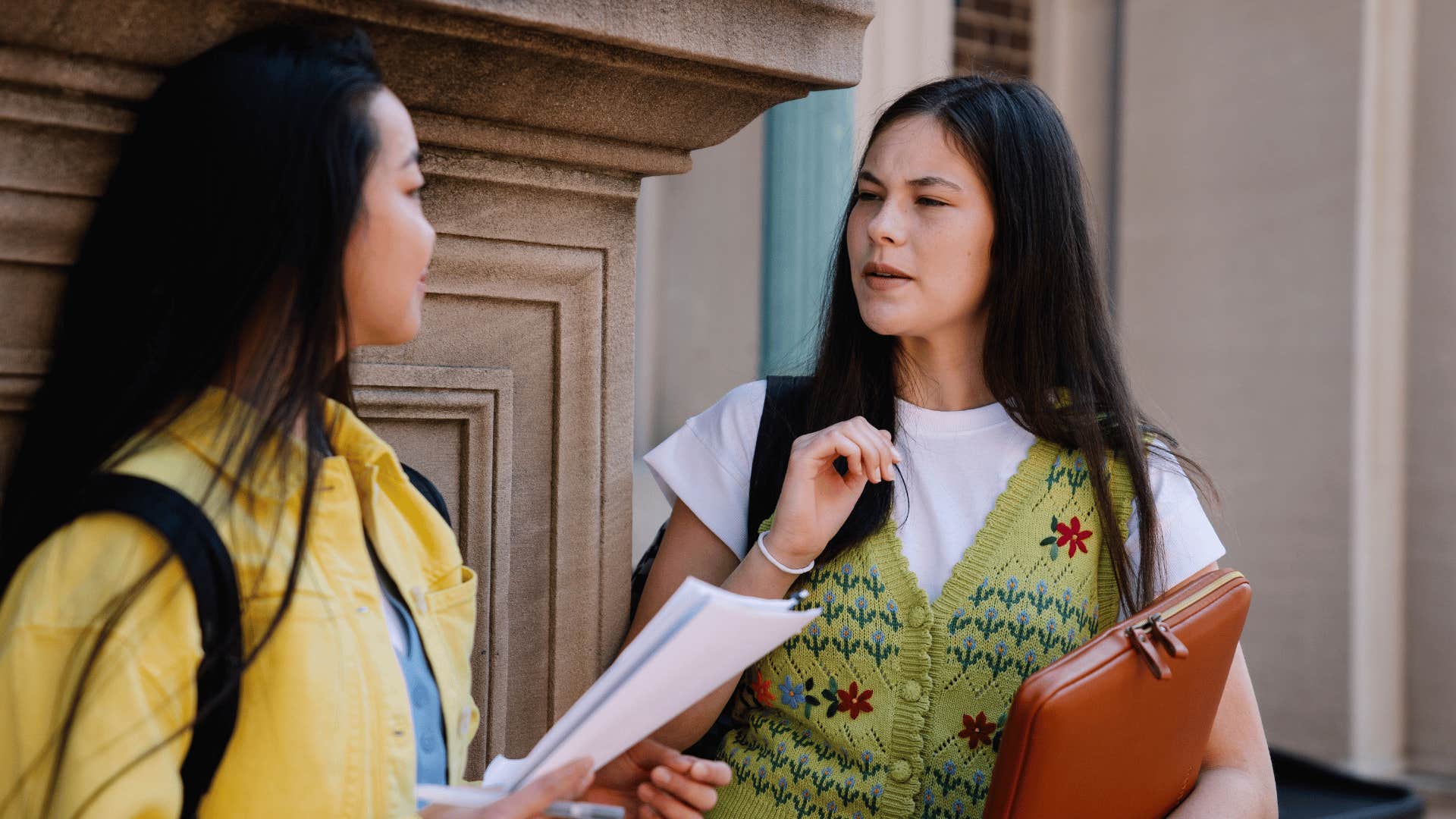 standoffish woman telling friend i'm not talking about this avoiding conflict