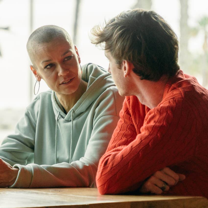 emotionally and socially uncomfortable woman telling her friend she's sorry