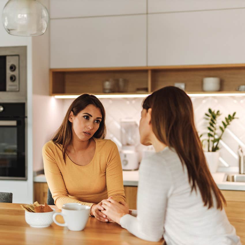 woman with weak mental and emotional boundaries telling friend it's fine over coffee