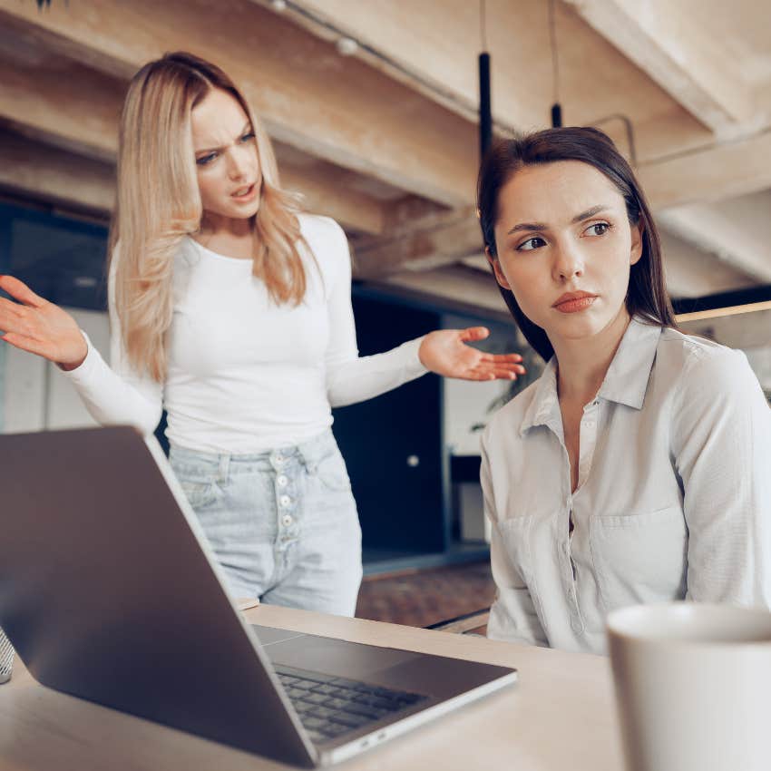 woman slowly losing mental emotional patience with co-worker tells her i'll get to it eventually