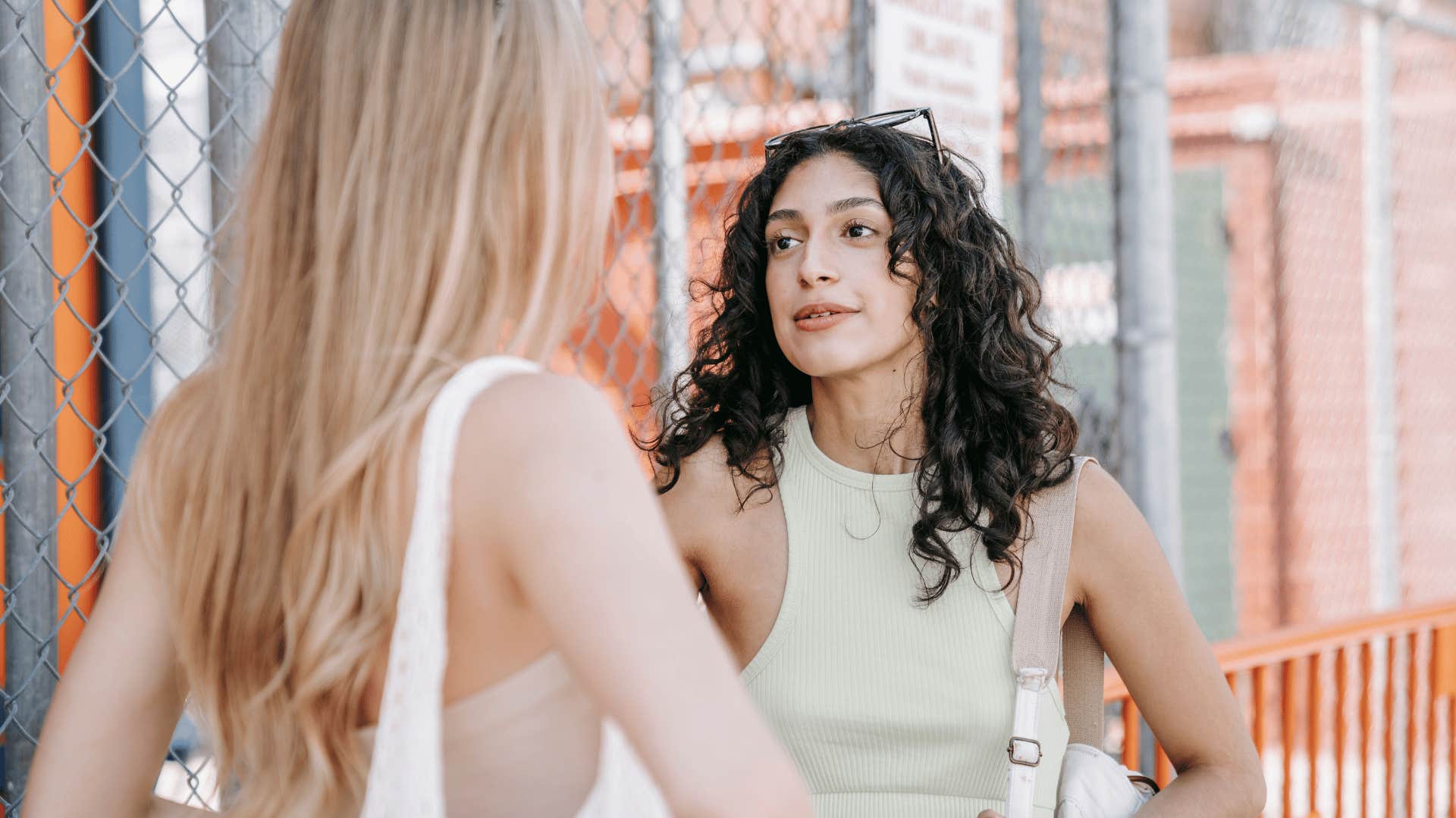 angry woman yelling at her friend about her uncertainty