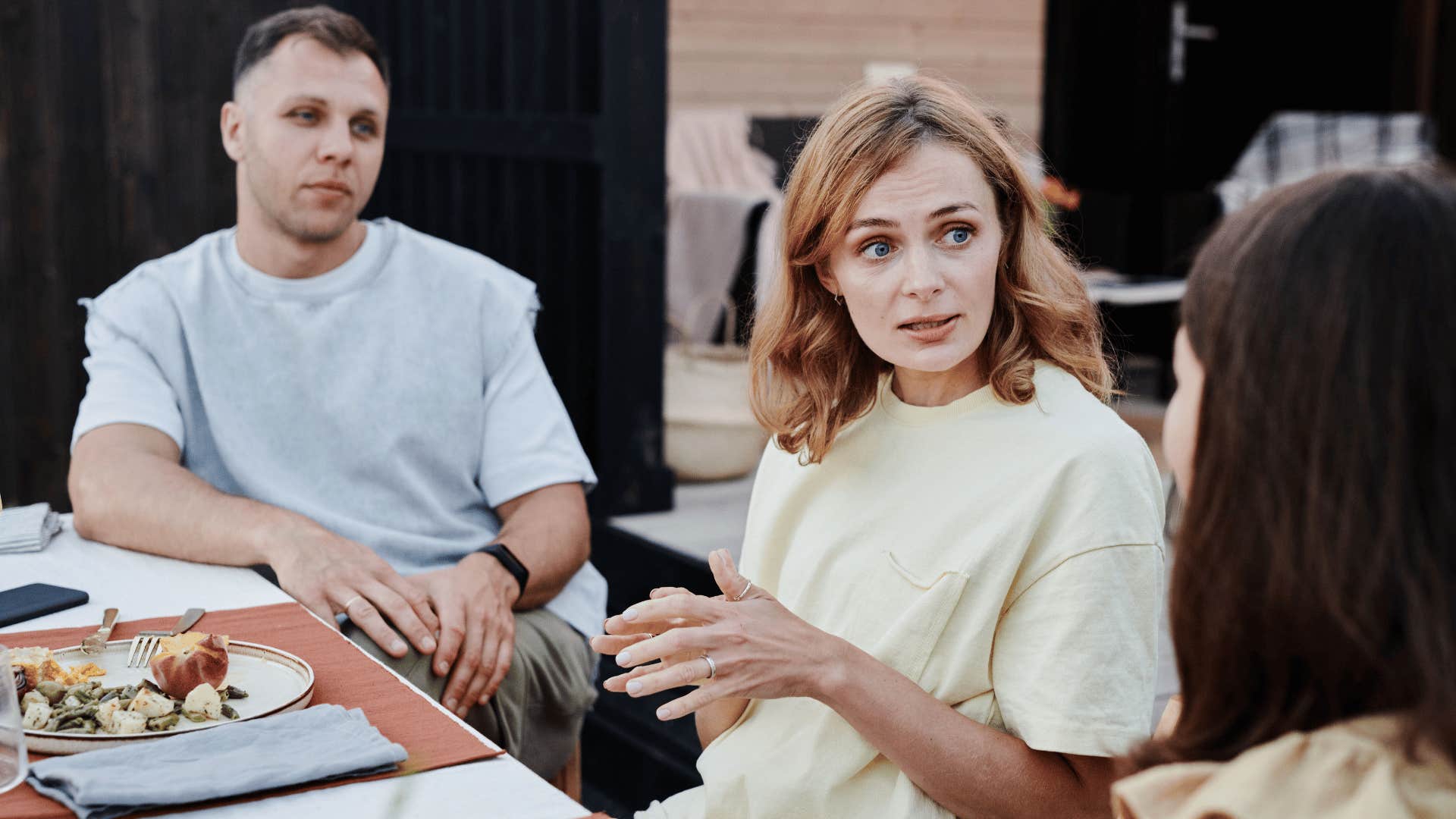 woman with guilt in her heart telling friend you don't understand