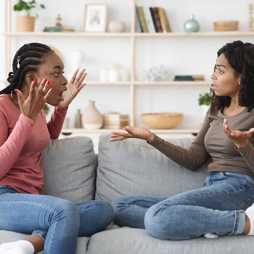 woman telling her friend not to embarrass herself