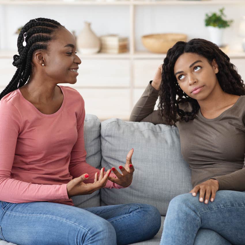 honest woman telling her friend she's happy for her but not for herself