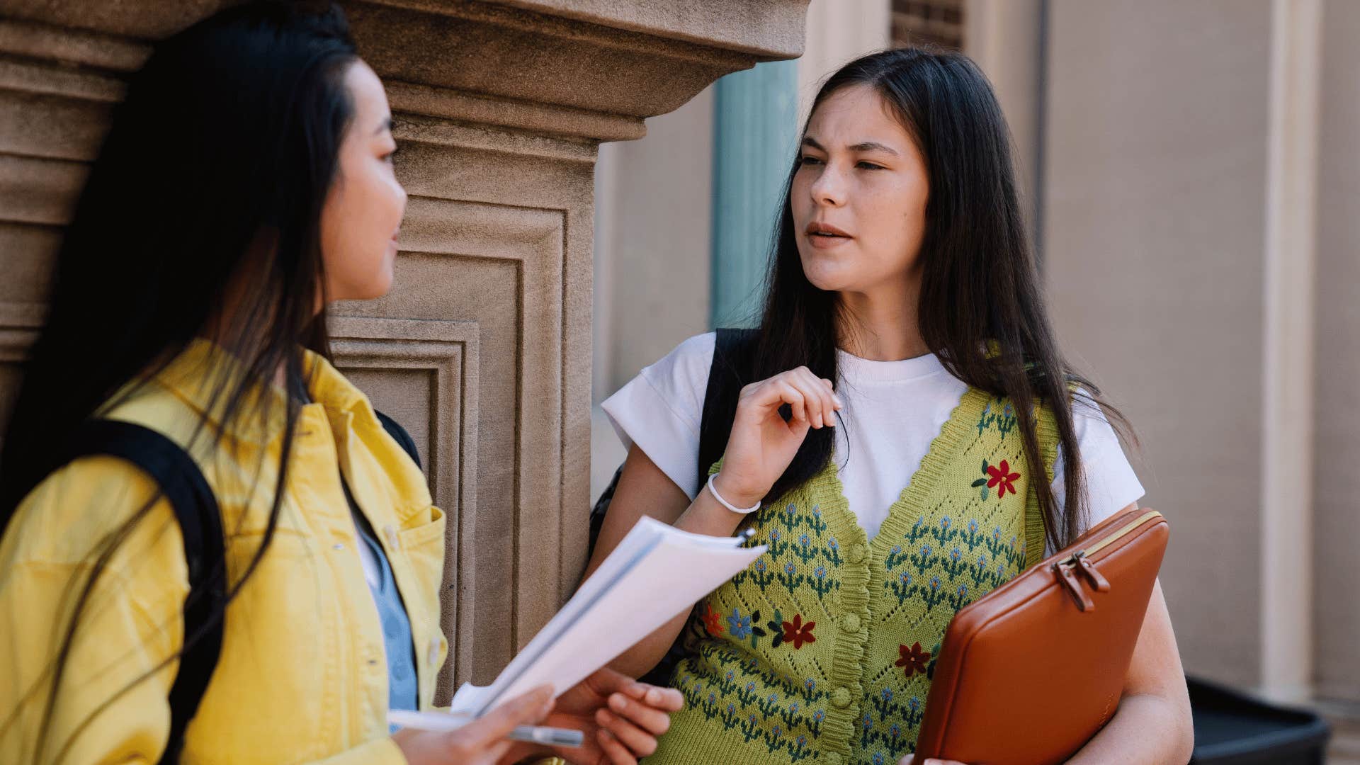 friend in an intense conversation wanting to write something down
