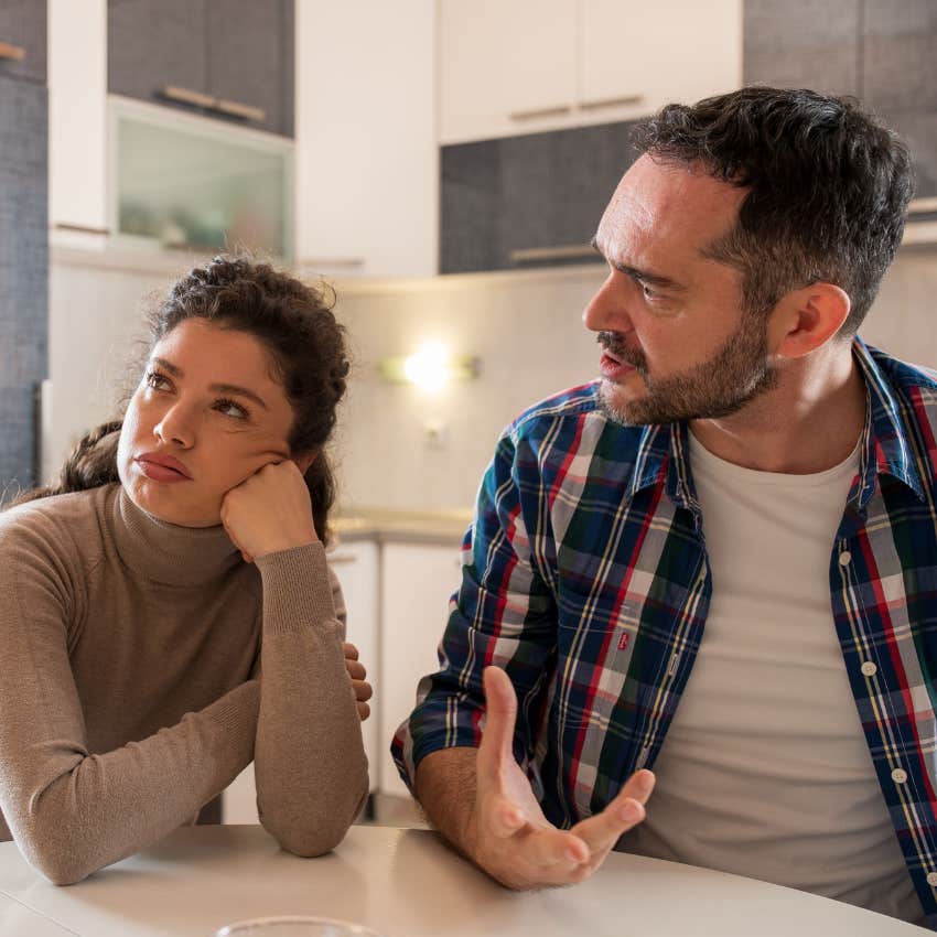 seriously irritated husband in plaid shirt telling wife if you say so