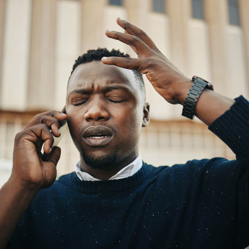 seriously irritated man talking on the phone eyes closed telling friend whatever