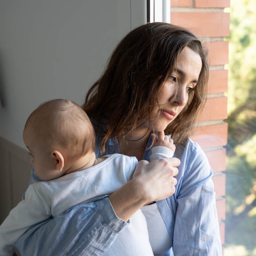 young mom who wishes she didn't listen to her boomer parents and waited to have kids