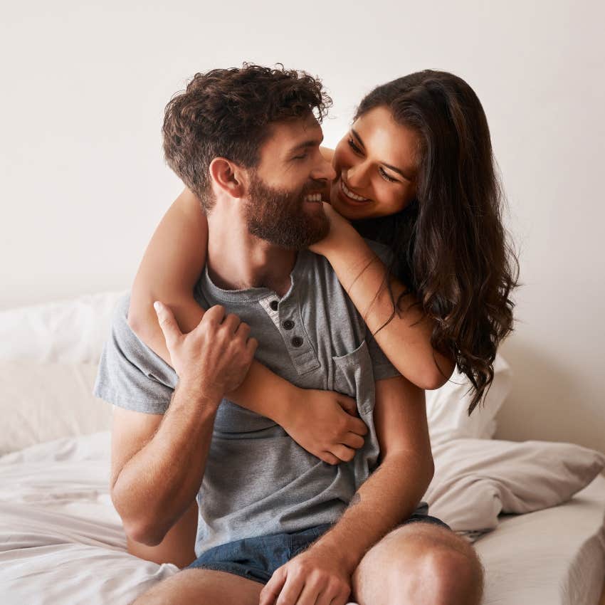 couple hugging protecting each other's peace at home