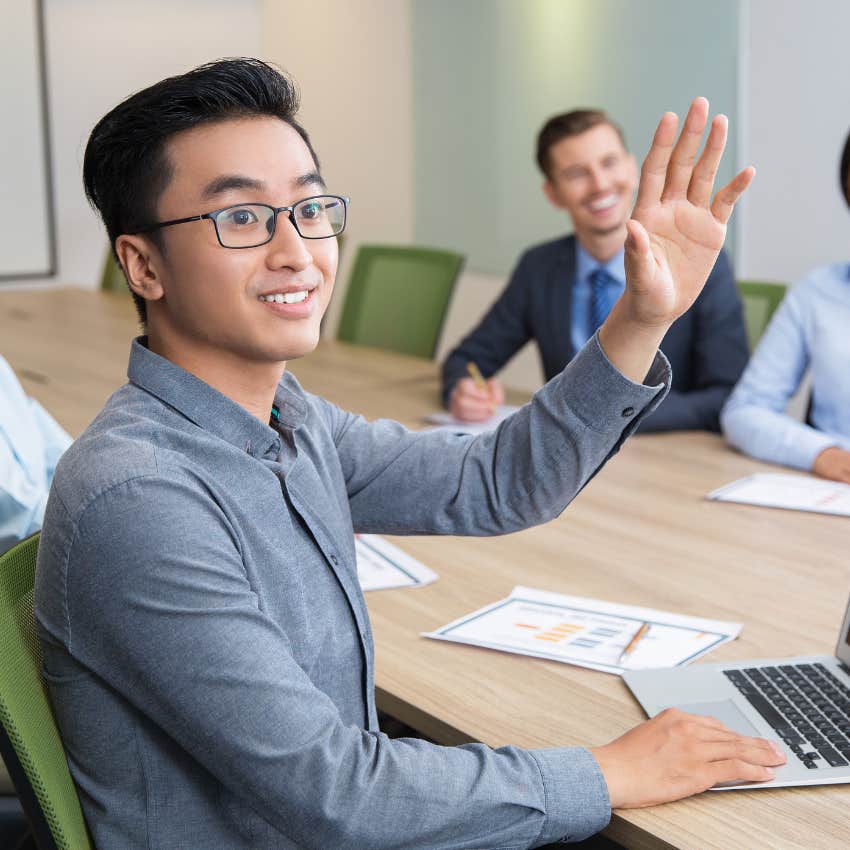 smart man asking questions at work