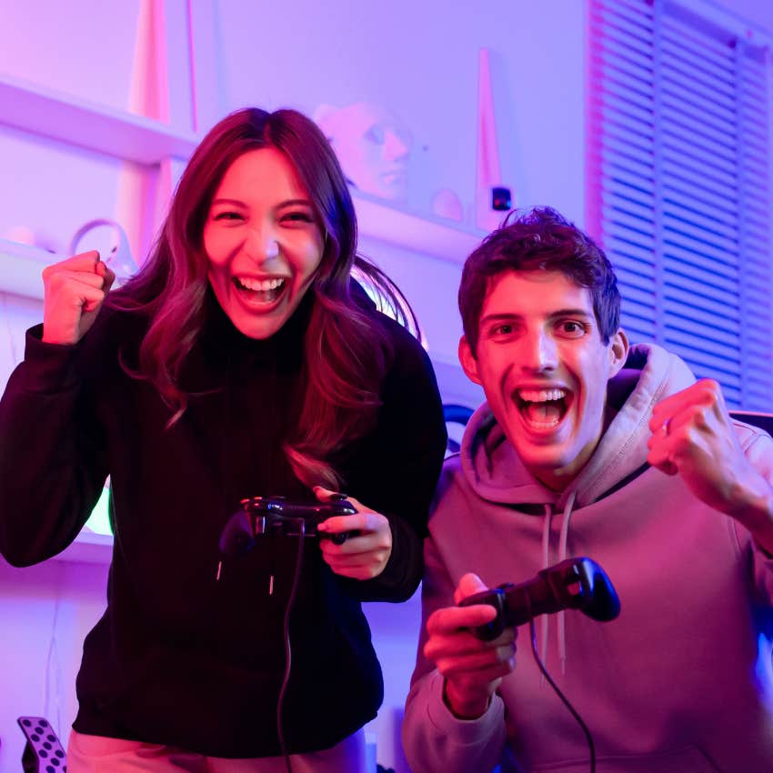 happy couple playing video games making shared memories
