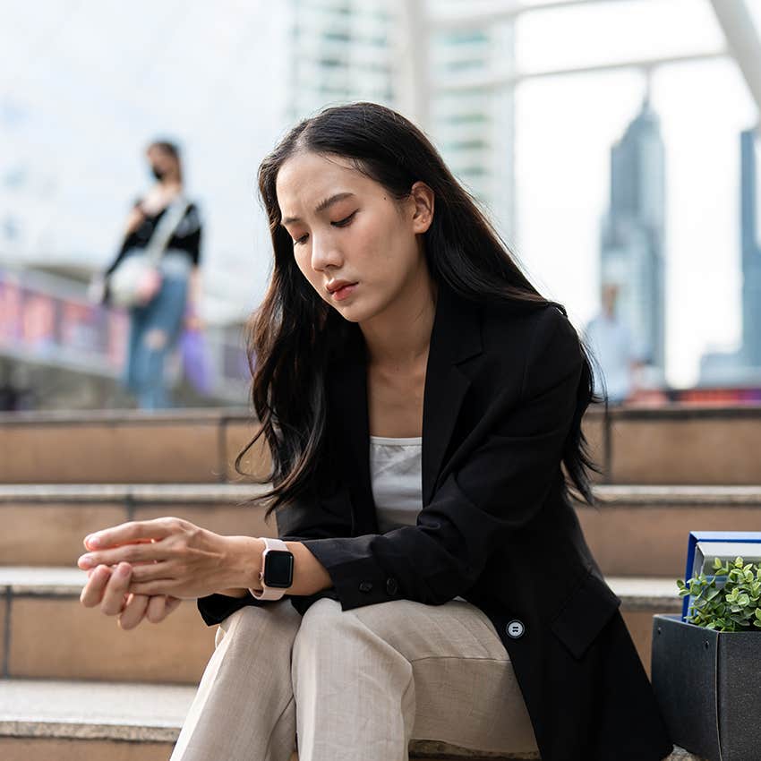 sad professional woman feeling defeated thinking she's not smart enough