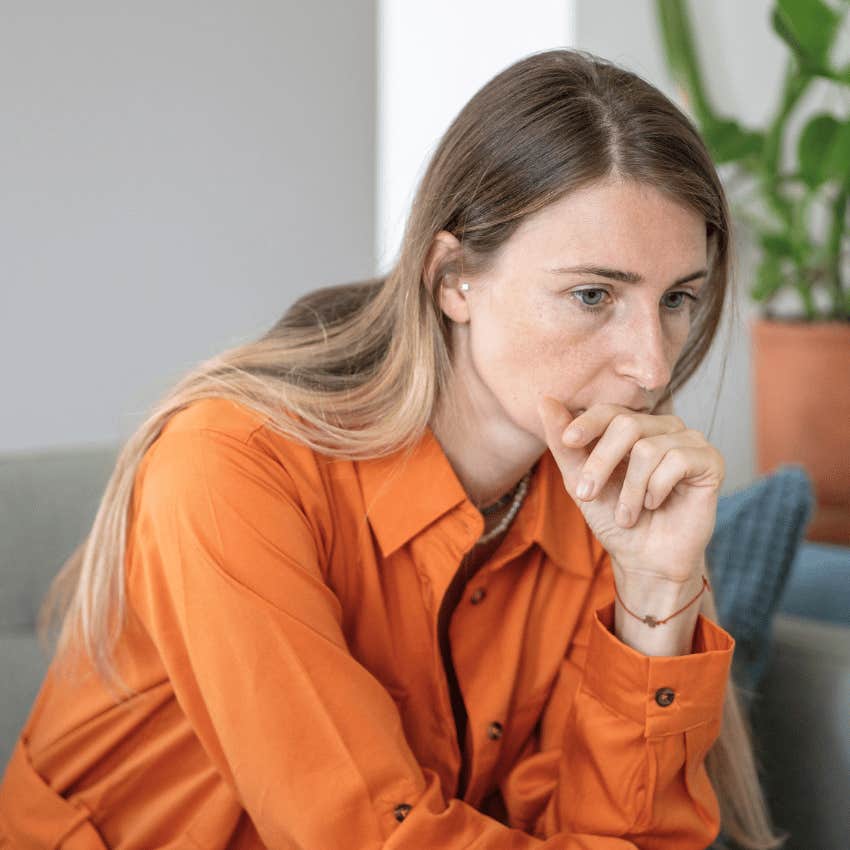 serious thoughtful woman learning more about herself