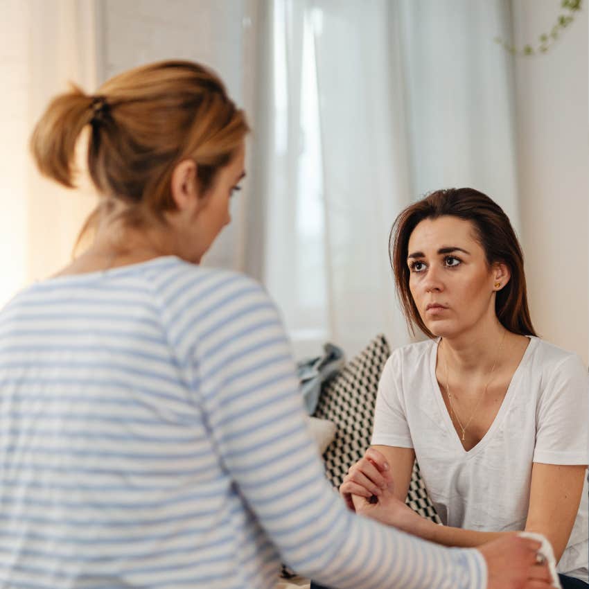 fake woman listening to friend speak saying i hear you