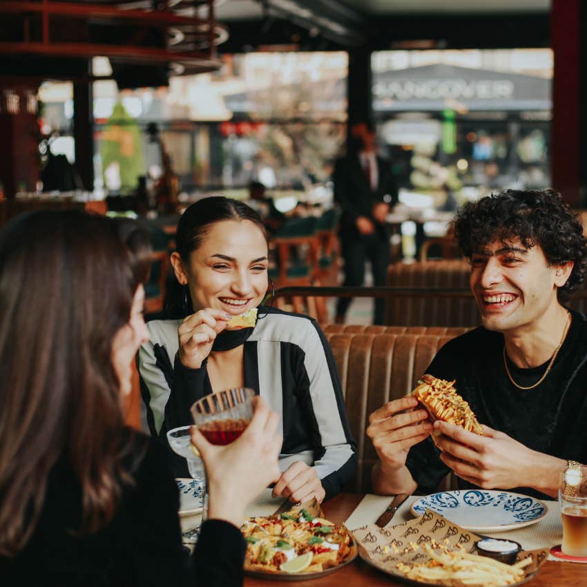 worn out man spending time with his female friends 