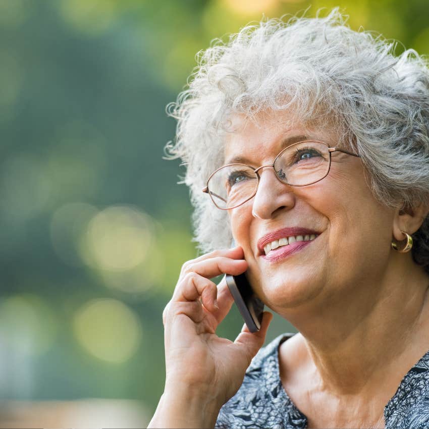 boomer woman looking happy on a phone call