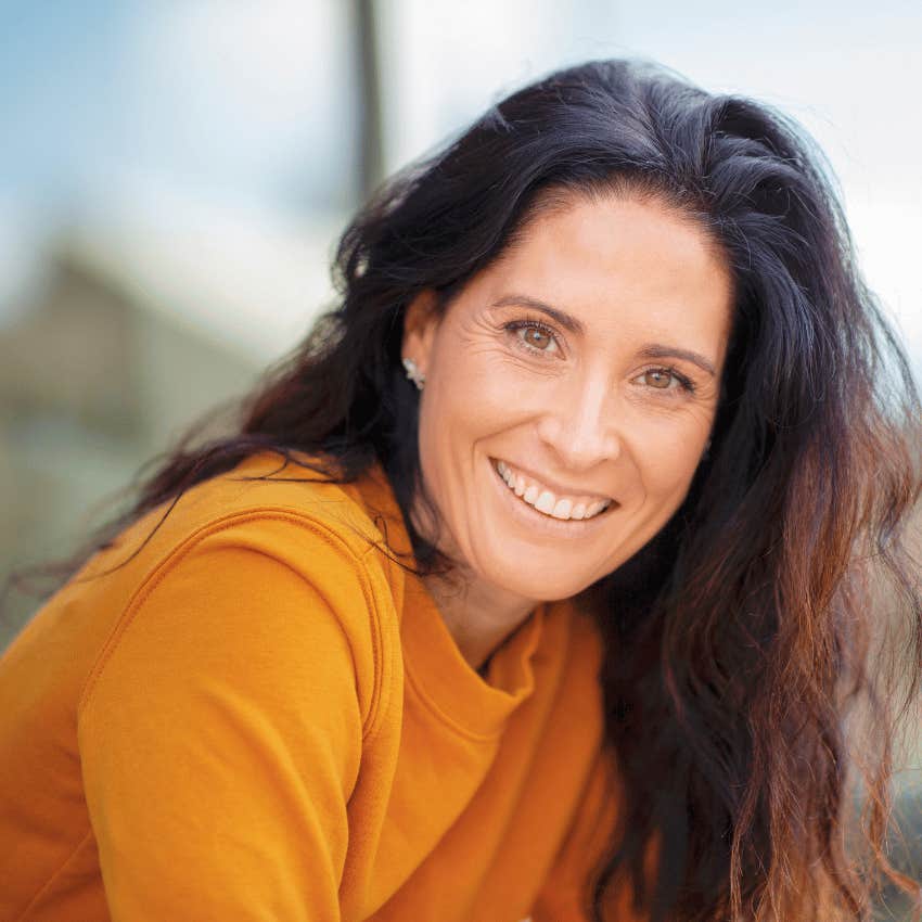 smiling middle age woman not caring about her looks