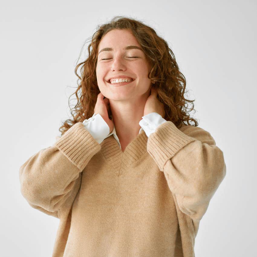 smiling young woman healing from a bad childhood