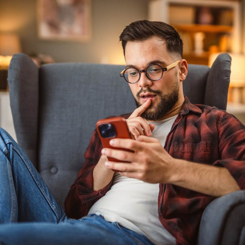 introvert man canceling plans via text so he can enjoy time at home