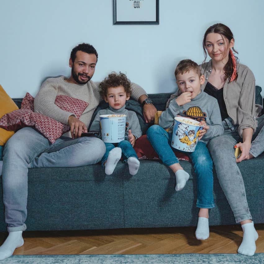parents having a family movie night with their kids
