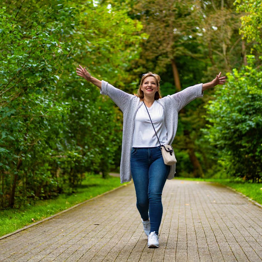 woman with ADHD arms out accepting who she is