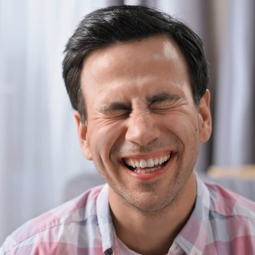 man with adhd laughing because he has a great sense of humor