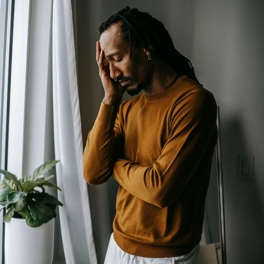 man with a sixth sense feeling things deeply overwhelmed