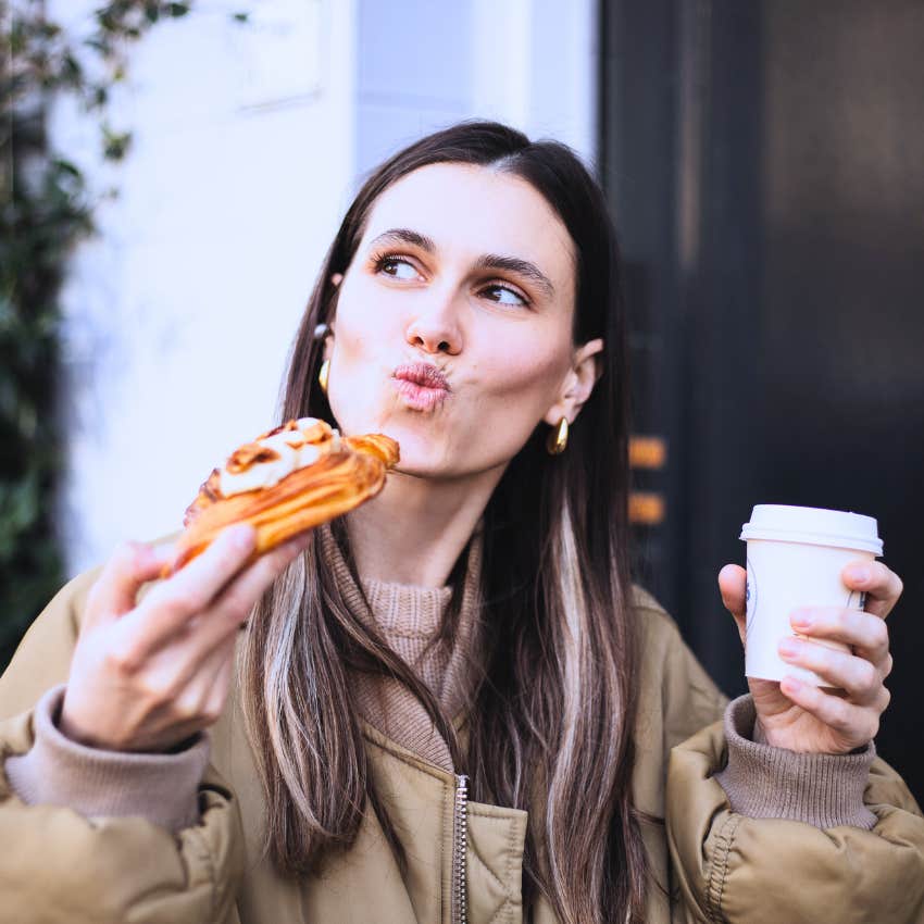 woman eating a treat she wasn't allowed to buy as a kid