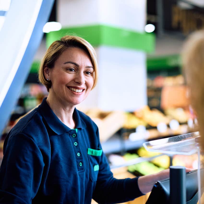 gen X woman using small talk with customer at the grocery store