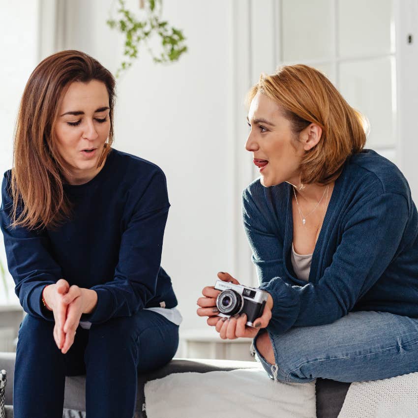 woman trying to talk about the opinion her friend showed