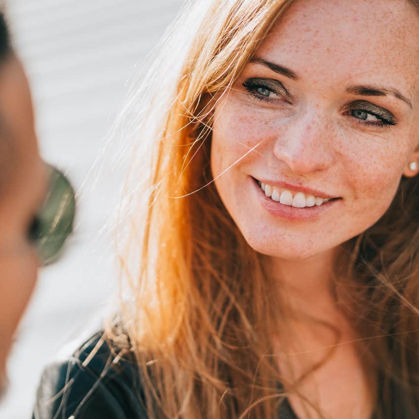 woman with intellectual curiosity thinking about man's completely different life