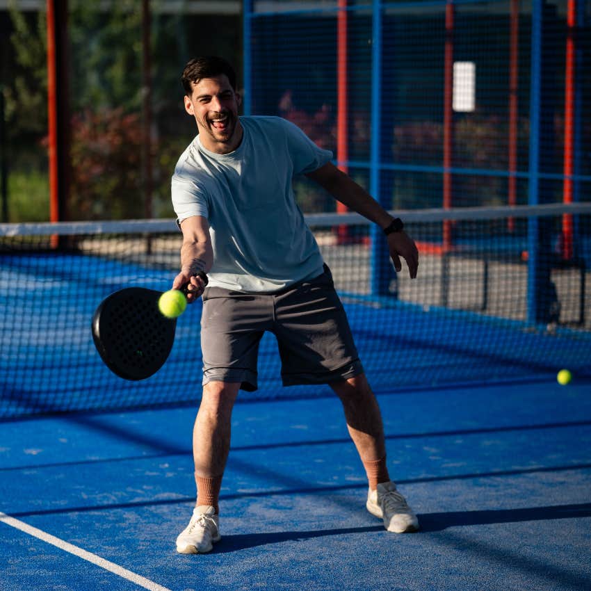 happy man who stopped chasing perfection and is just having fun on tennis court