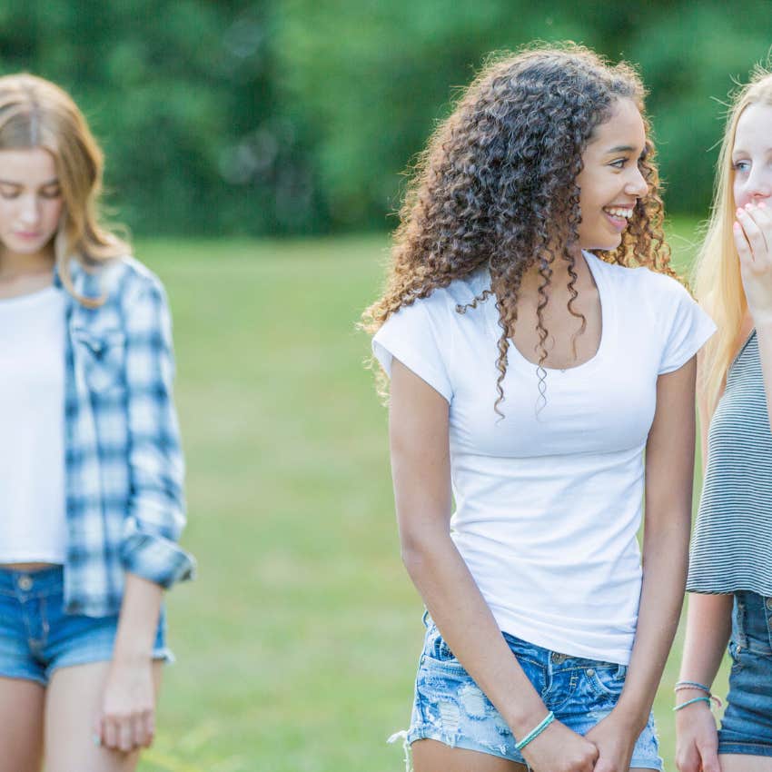 sad woman with toxic friends leaving her out
