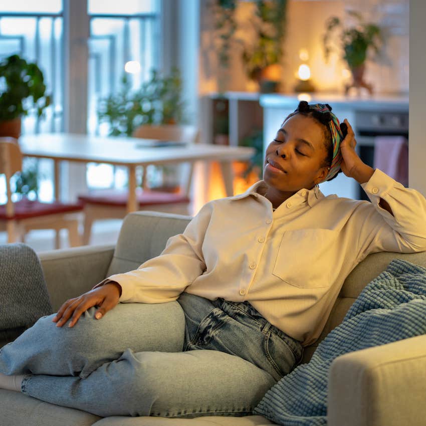 woman who values her time and energy relaxing in her living room instead of being available