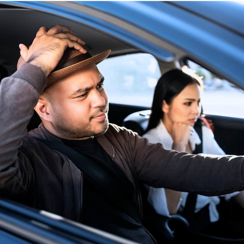 man driving his car with woman he trusts