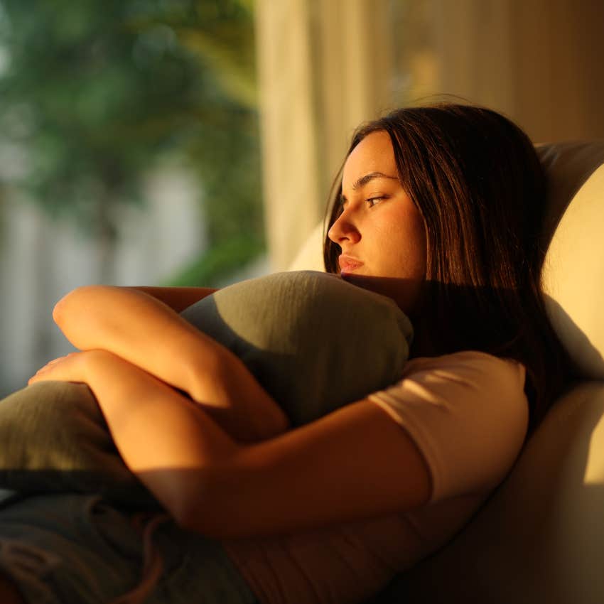 woman about to take a nap to avoid here emotional pain