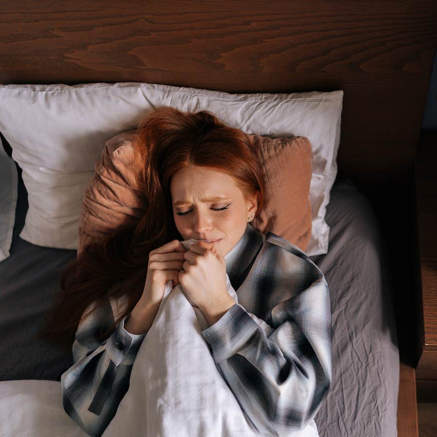 woman trying to nap to escape feelings of grief