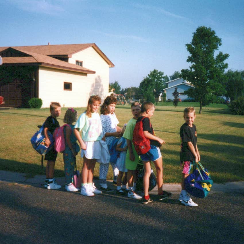 kids in the 80s waiting at the bus stop built character