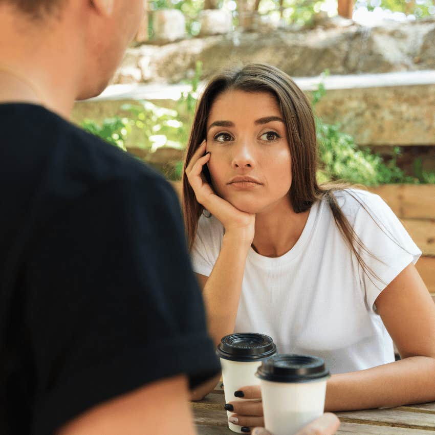 woman with a bored expression on a bad date
