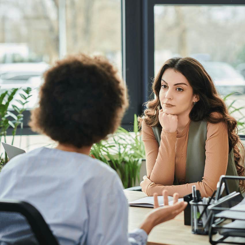 woman with high self respect telling coworker she'd be happy to talk with a respectful tone