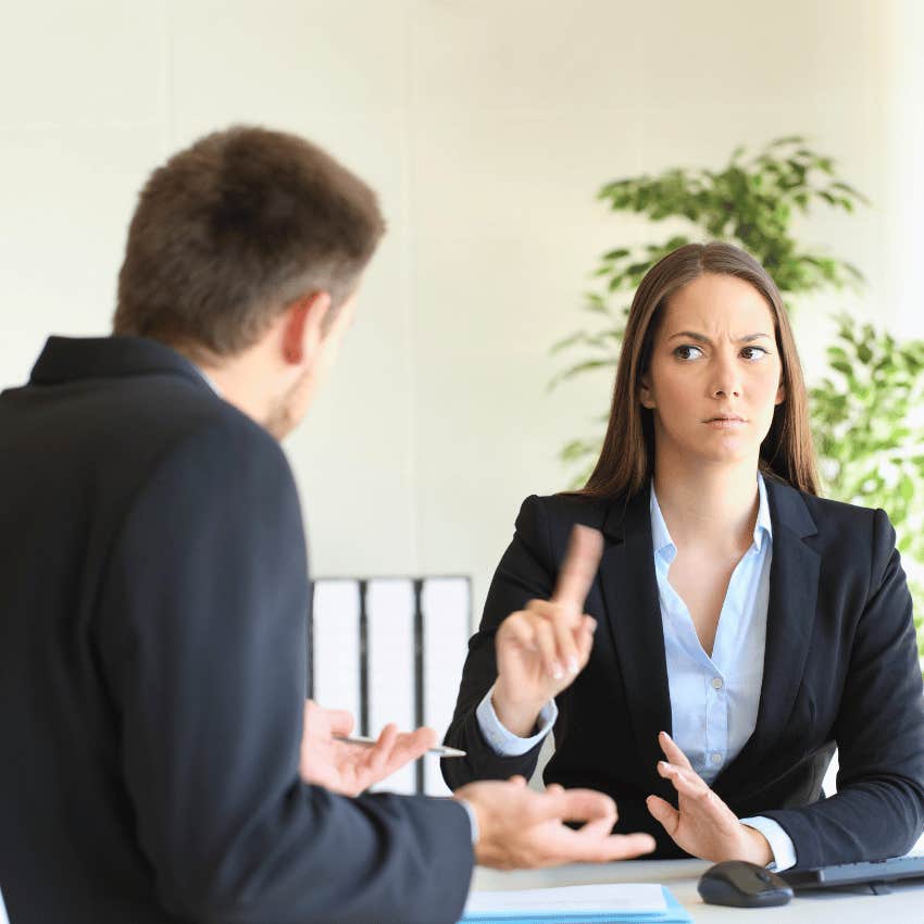 woman reprimanding man for talking too much
